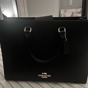 Coach Black Leather Handbag with Gold Details
